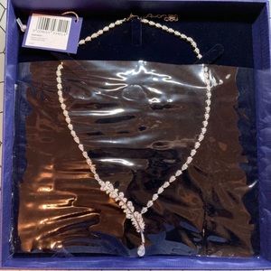 Brand New in box Swarovski Y shape feather earring